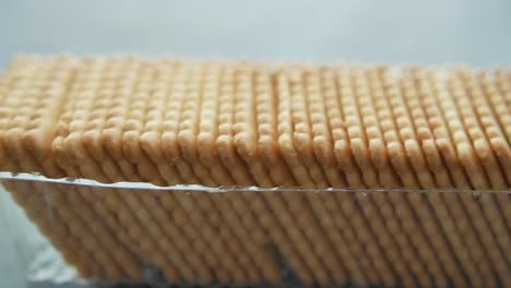 Close-up-of-cookies-in-a-plastic-packet-on-table