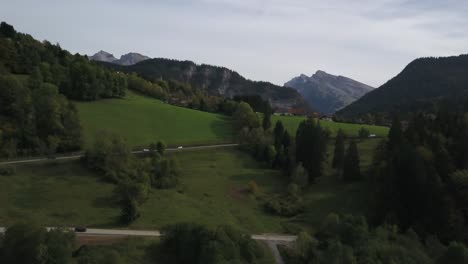 Cars-driving-along-mountain-road-of-Haute-Savoie-in-France