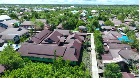 The-drone-focuses-on-circling-the-Indonesian-Army-task-force-post-in-Asmat,-Papua,-Indonesia