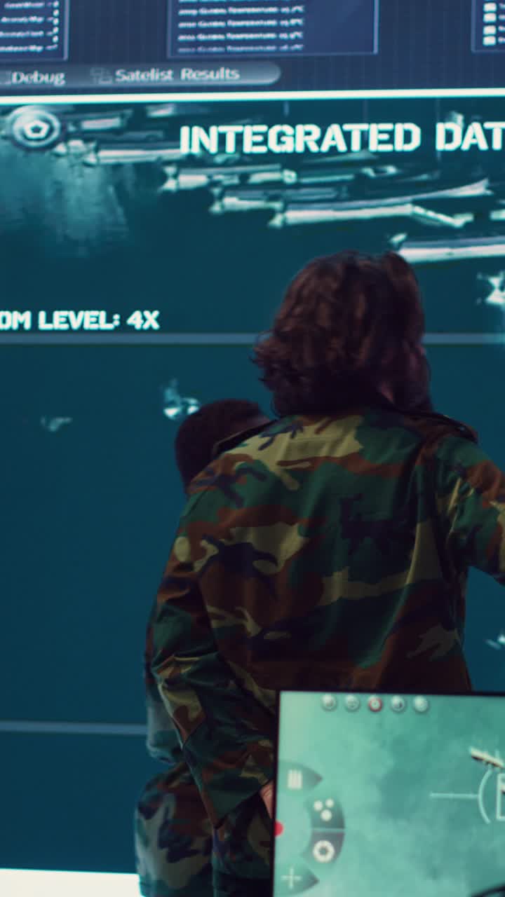 Military Personnel Monitoring Data in High-Tech Control Room