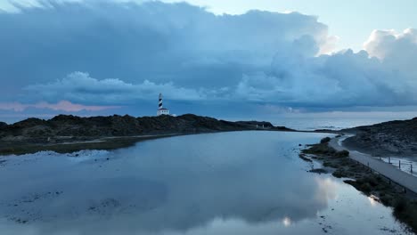 impresiones de reflejo del faro de favaritx en islas baleares españa