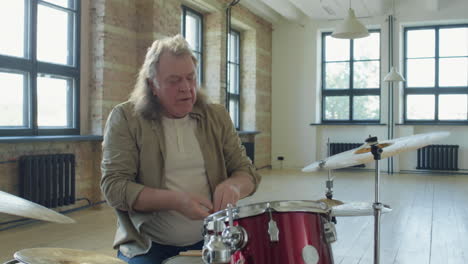 mature drummer replacing hi-hat