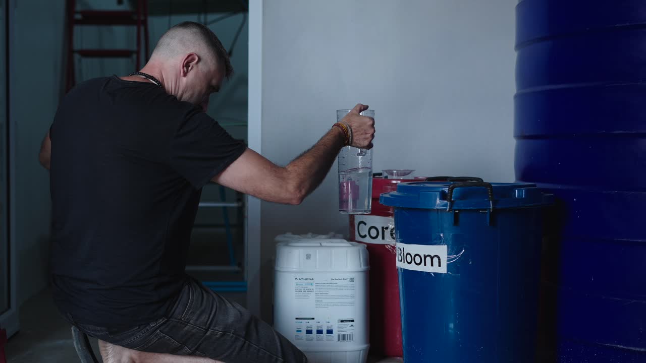 Worker Mixing Chemicals in a Lab