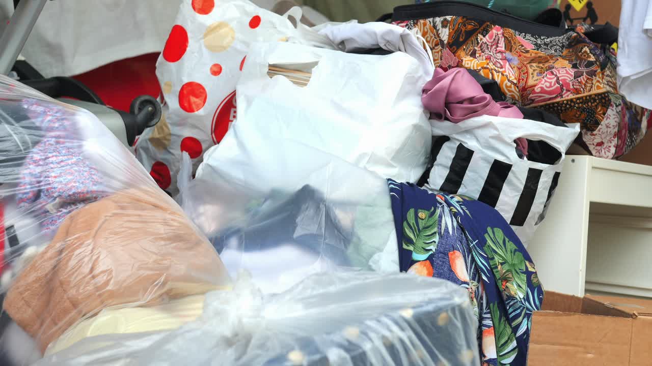 Pile of clothes and bags