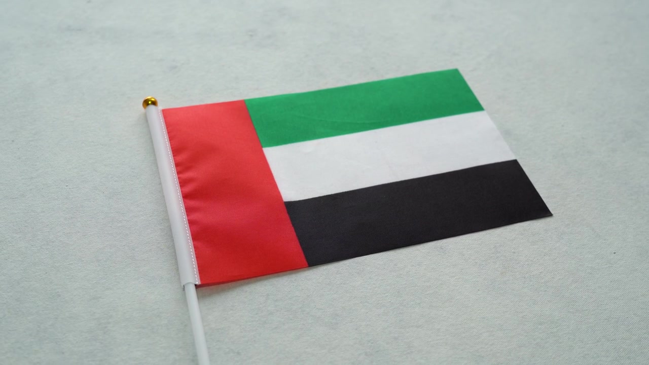 United Arab Emirates country flag close-up. UAE flag concept.