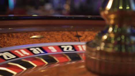 spinning roulette in casino, closeup view of numbers with no ball