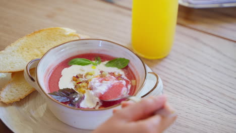 gazpacho soup with bread and orange juice