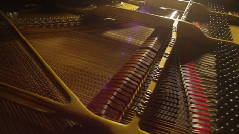 gimbal shot of piano strings an mechanism