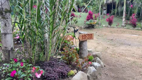 pre columbian statue in the garden setting of a rural eco hotel in colombia