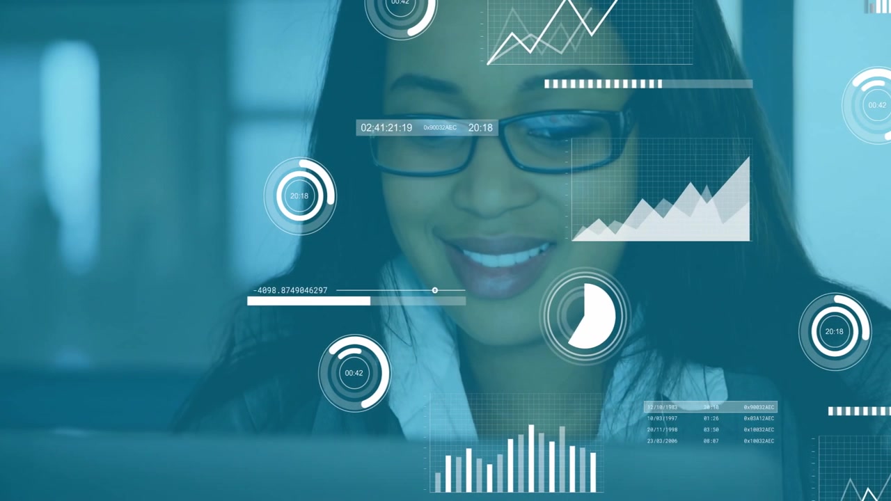 Female business analyst opening laptop, summoning data charts, pulling on glasses and smiling
