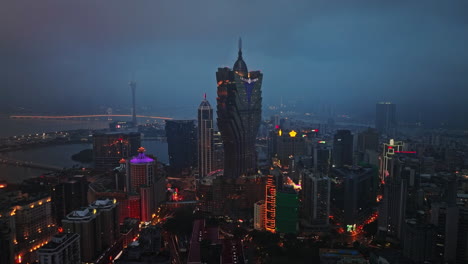 a view of a city at night from the top of a building