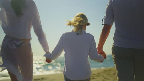 family enjoying a day at the beach