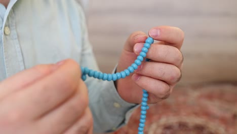 muslim prayer with rosary beads