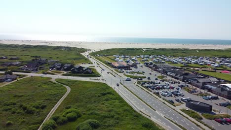 Aerial-Shot-of-Lakolk-Beach-and-Highway-on-Romo-Island,-Denmark