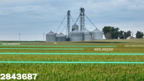 agricultural silos and farmland overlaid with data metrics, representing smart farming technology