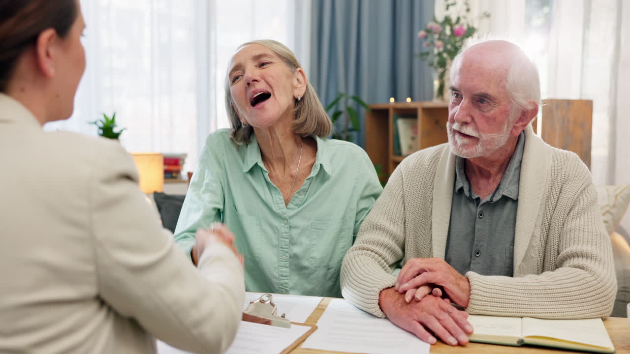 Senior couple meeting with financial advisor for retirement planning