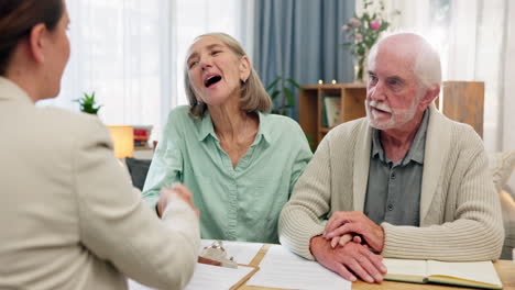 senior couple meeting with financial advisor for retirement planning
