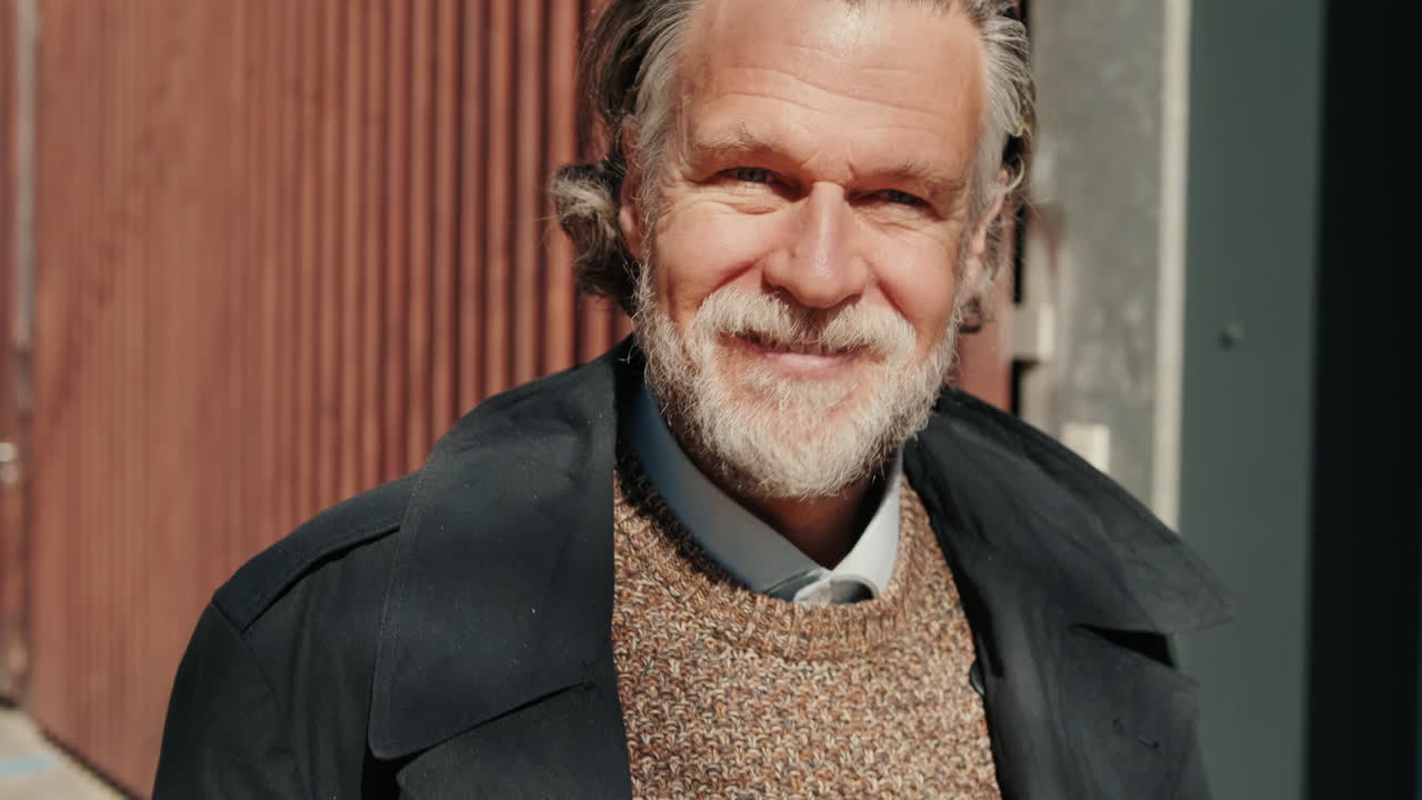 Portrait of a Smiling Confident Mature Man in the City