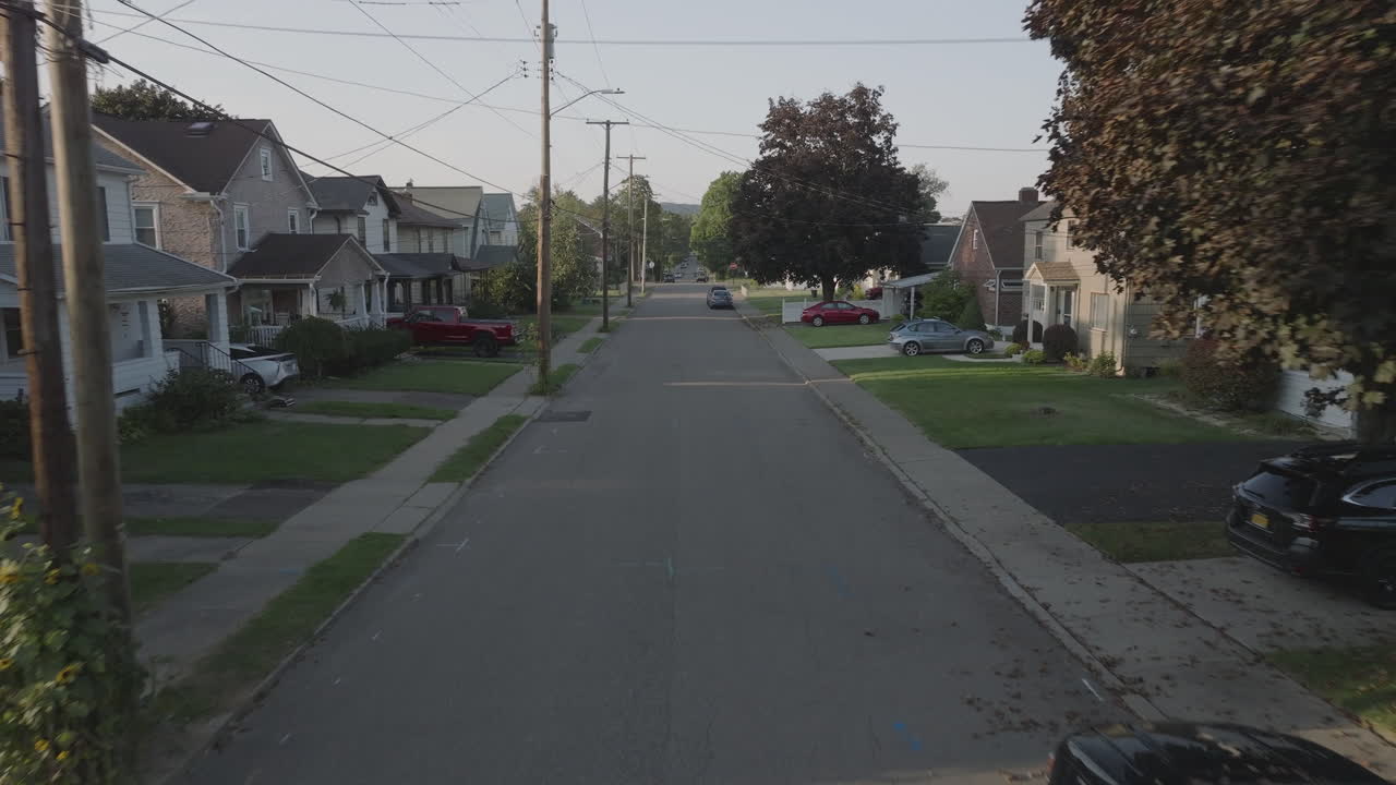 Aerial view of homes in Binghamton, New York. Shot in the west end on a summer evening.