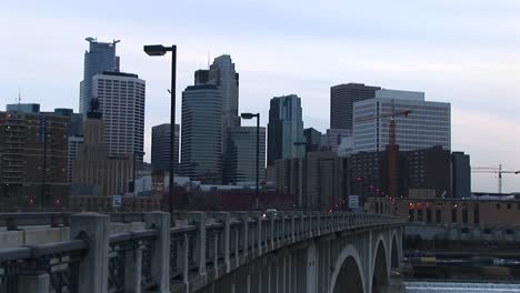 Traffic-Moves-Across-A-Bridge-Into-The-City-In-This-Clip