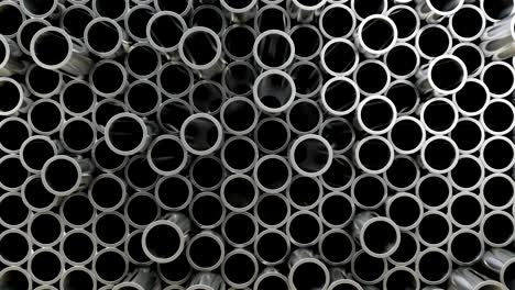 3d illustration. wall of steel pipes. randomly located