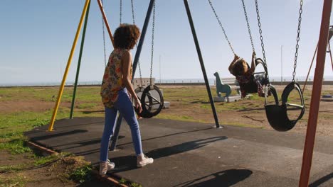 mother and son having fun at playground