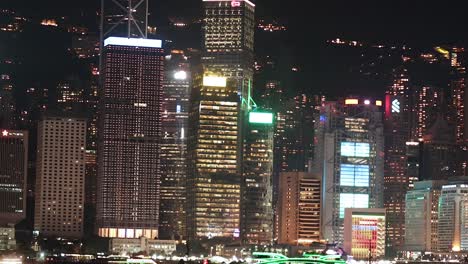 colorful lights illuminate hong kong's skyscrapers