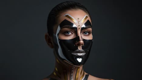 a stunning visual transformation featuring intricate face art, glossy patterns, and an elegant model, capturing the essence of modern artistry in makeup and design