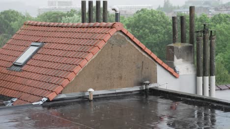 heavy rain with lightning on the rooftops in the suburbs - static slow motion shot