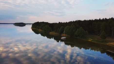 Aerial-Shot-of-Lake-Wdzydze-at-Sunset