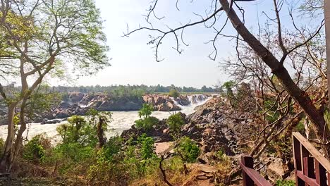 breathtaking waterfall view from a wooden deck