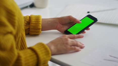 closeup woman hands surfing internet on smartphone. girl relaxing with mobile