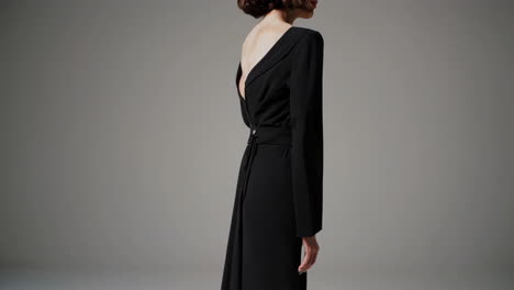 woman in a black wrap dress