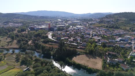 aerial view of ave river near silvares guimaraes portugal surrounded by nature and town
