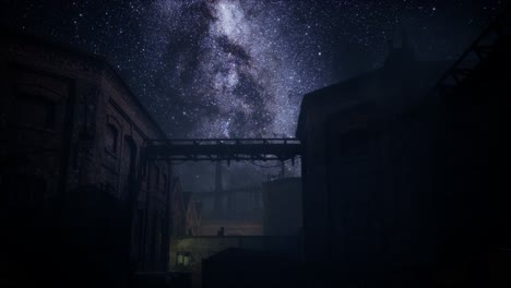 milky way stars above abandoned old fatory