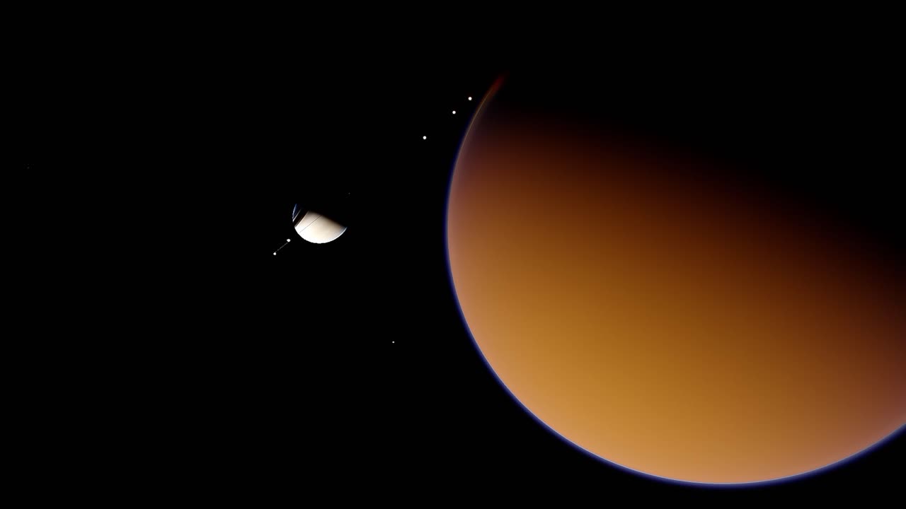 Titan Moon in front of Saturn slowly moving in the blackness of outer space