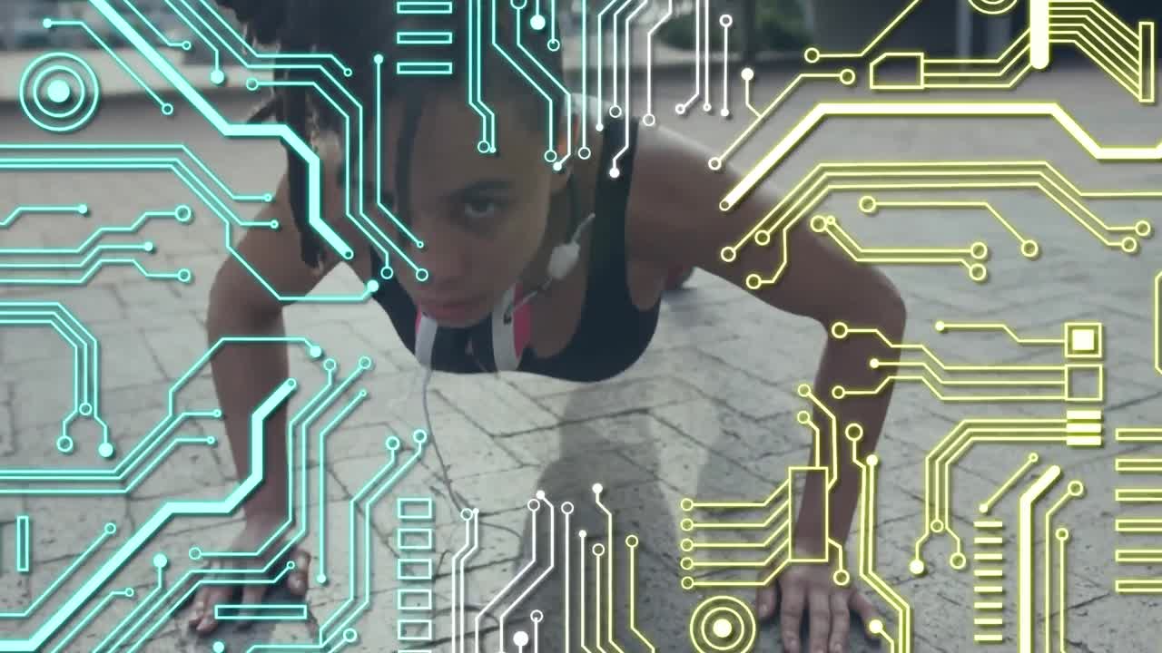 Microprocessor connections against woman performing push up exercise