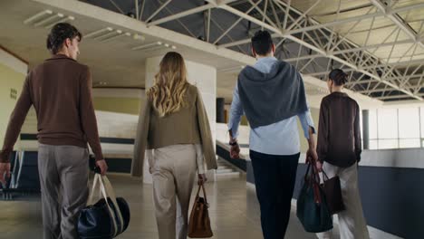 business people walking in a modern building