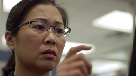 a close-up emotional portrait of a woman capturing a moment of concern and reflection in an engaging environment with subtle light and depth of field