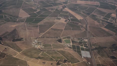 aerial shot of some dry rural farmland