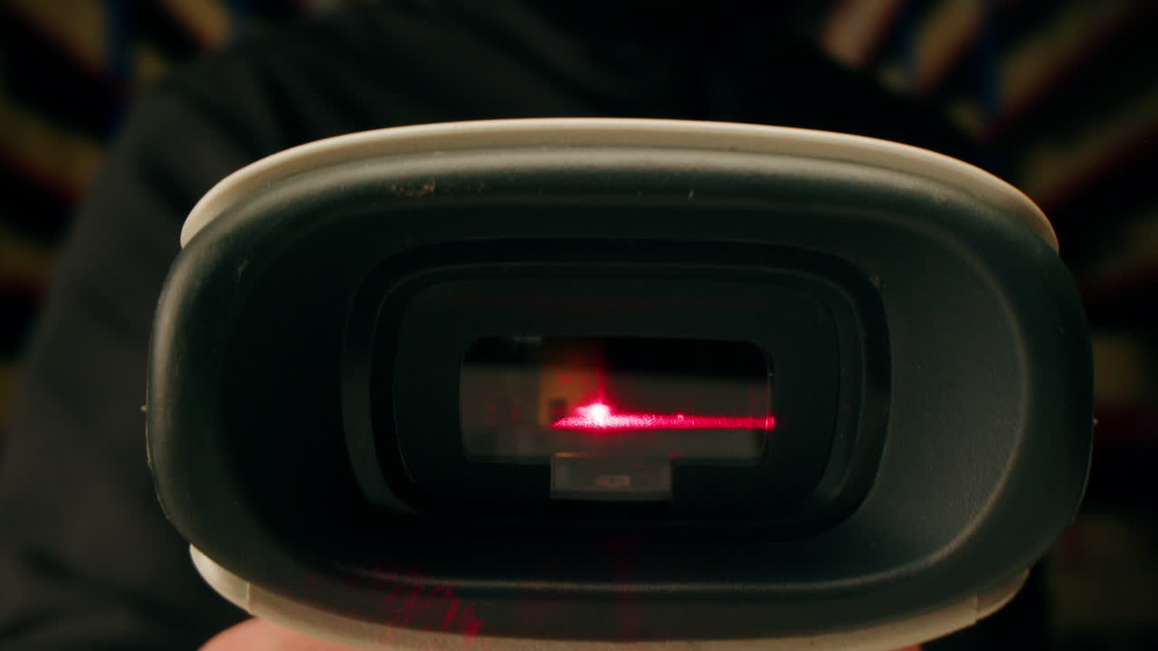 Scanner scan delivery box in storage, E-commerce shop, man packing goods and clothes second hand delivery market, courier Packaging and Shipping Workspace with Supplies and Technology, online sales.