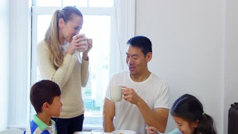 Happy-family-having-breakfast