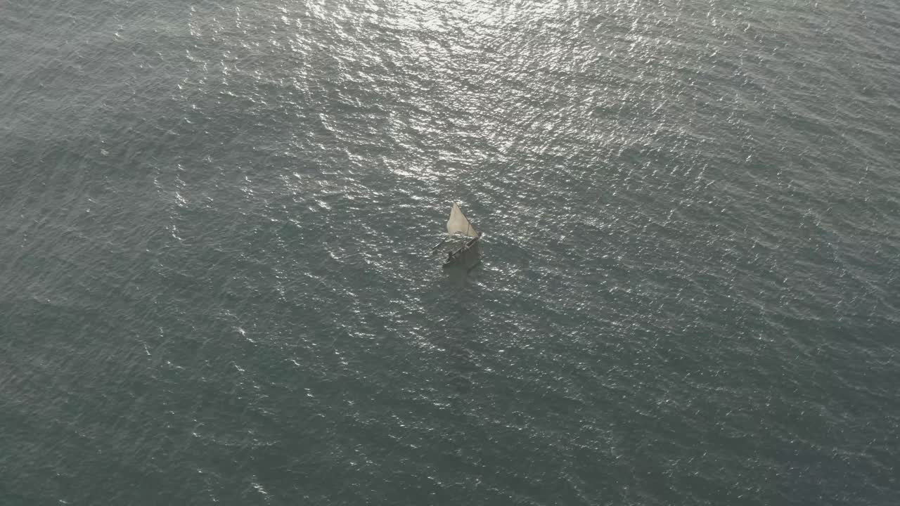 Sail boat in the middle of the ocean aerial view in Kenya coast