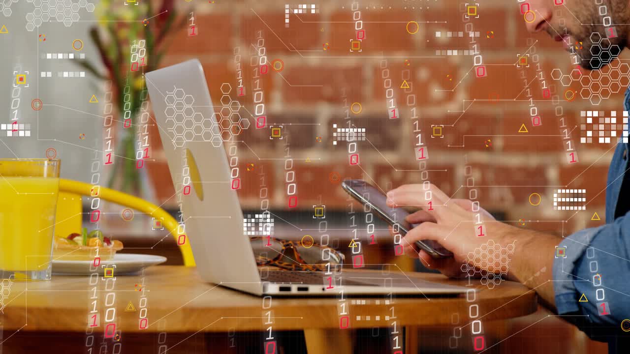 Working man in blue button-up shirt tapping smartphone and typing on laptop at cafe with sunglasses