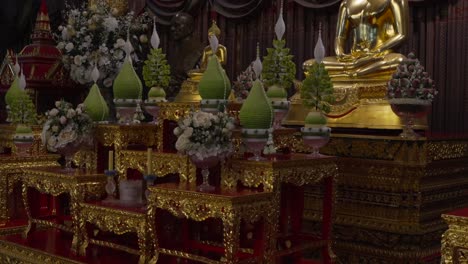 buddha shrine at wat paknam bhasicharoen bangkok thailand side tilt shot