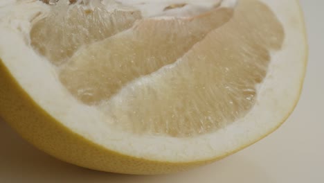 citrus maxima grandis halves close-up 4k