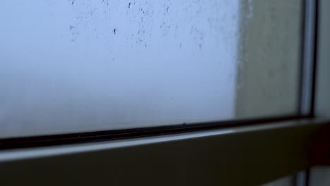 soft-raindrops-hitting-on-a-window