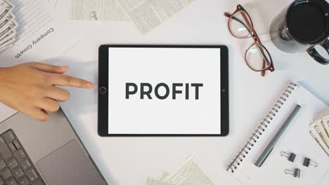 profit displaying on a tablet screen