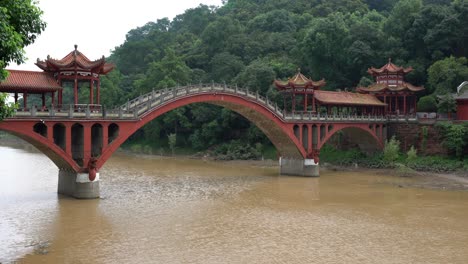 haoshang arch bridge in oriental buddha park and river view in leshan sichuan china