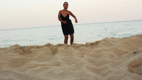 Girl-dancing-salsa-at-the-beach